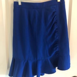Blue pencil skirt with ruffle detail, like new.